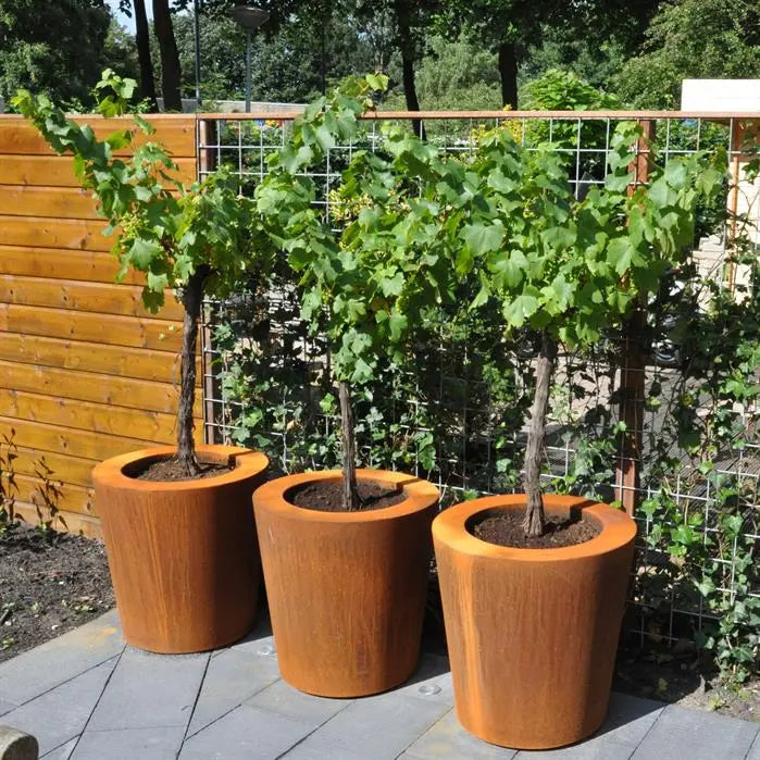 Maceta redonda de acero corten de 120 x 80 cm